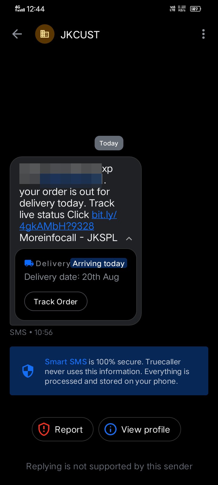 Fraudulent delivery text from "JKCUST" with suspicious link